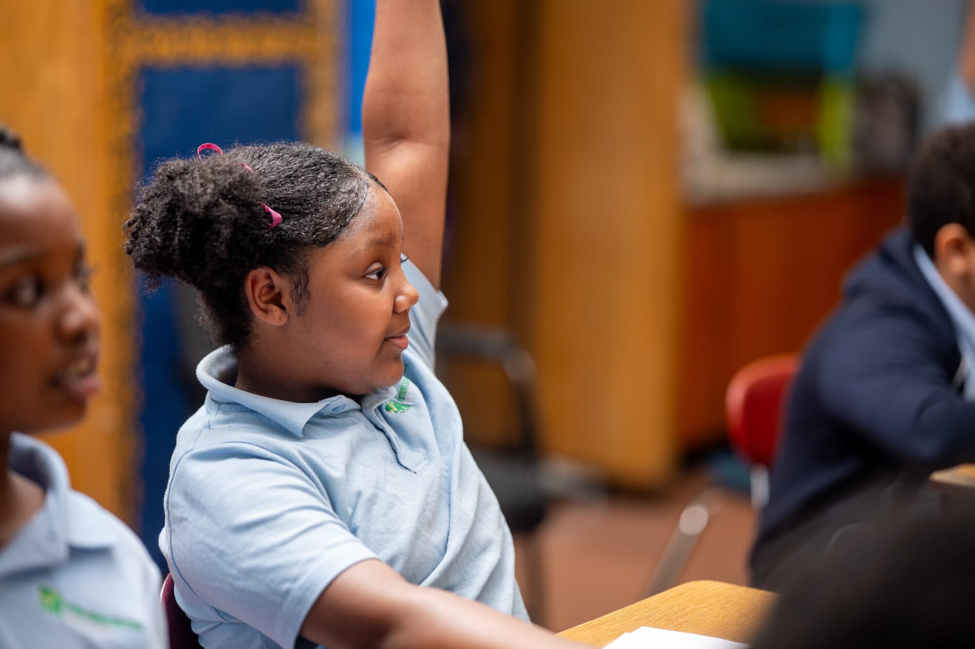 An FLI student in the school uniform polo.